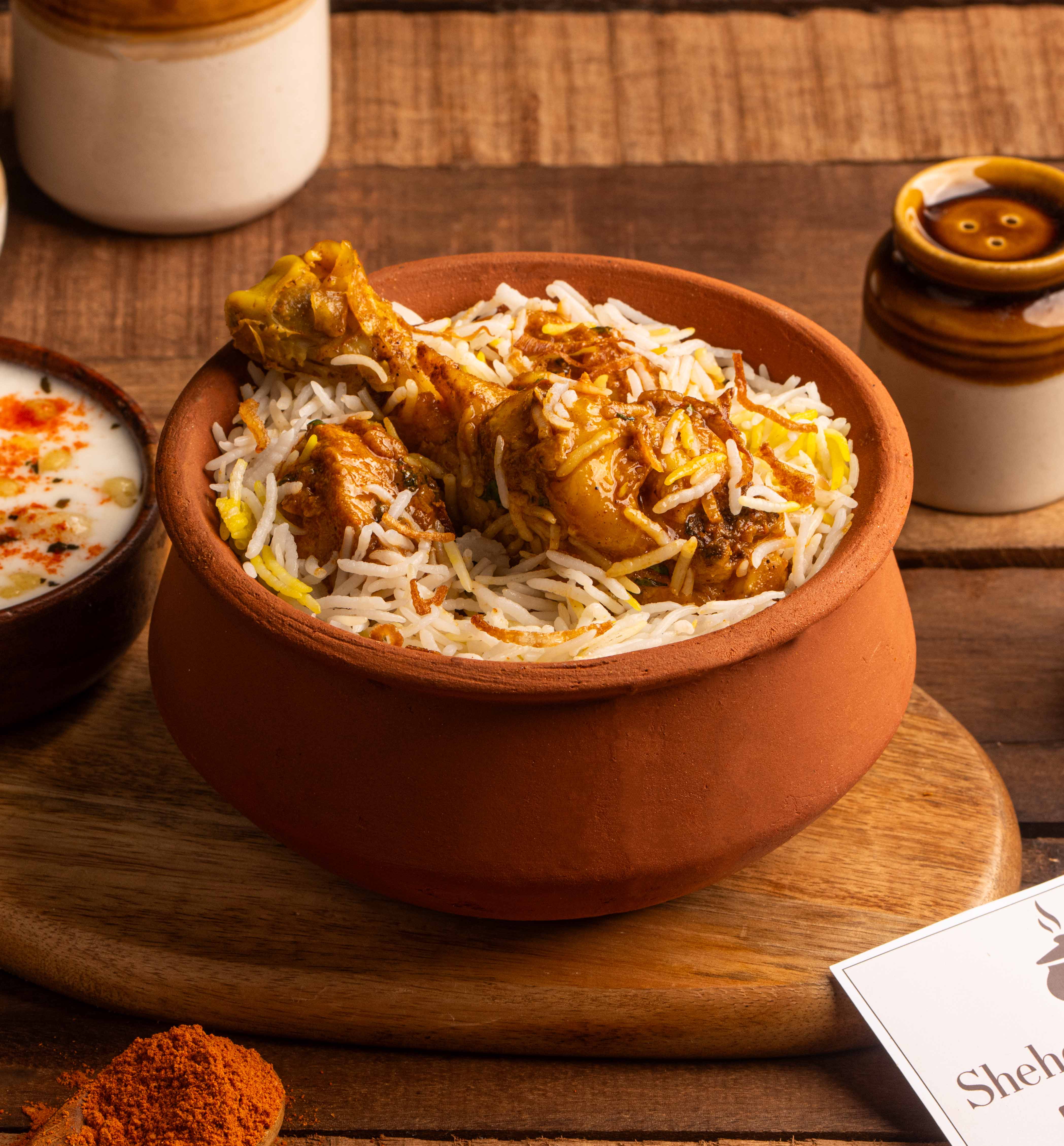 Authentic Chicken Matka Biryani sealed in a traditional clay pot